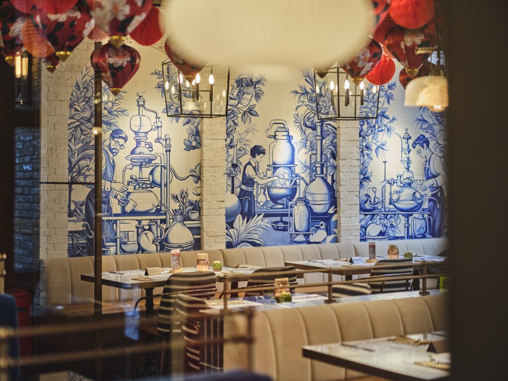 The refinery restaurant design by thread stage wall graphic